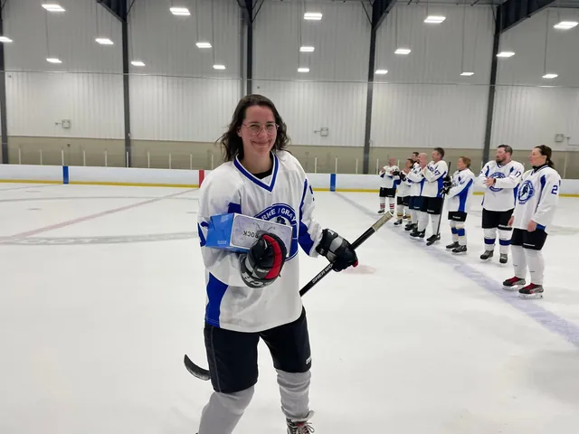 A player receiving MVP award post-game