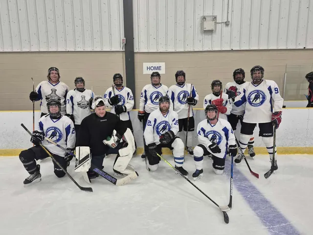 A co-ed team gathered on the ice at the Greenfoot Energy Centre